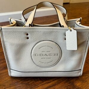 Coach bag! Unfortunately I do not have the crossbody strap.